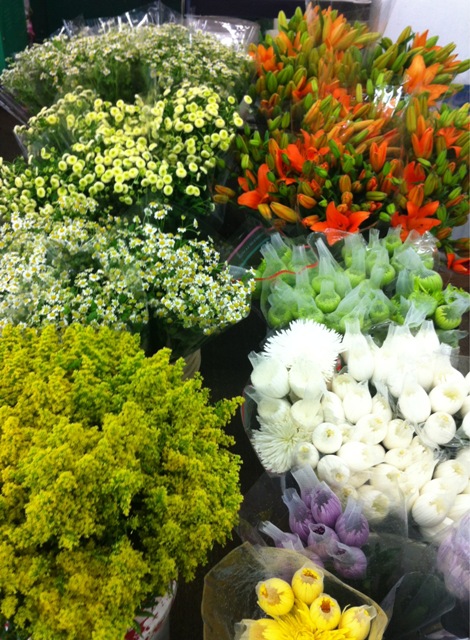 early morning starts at the flower mart.