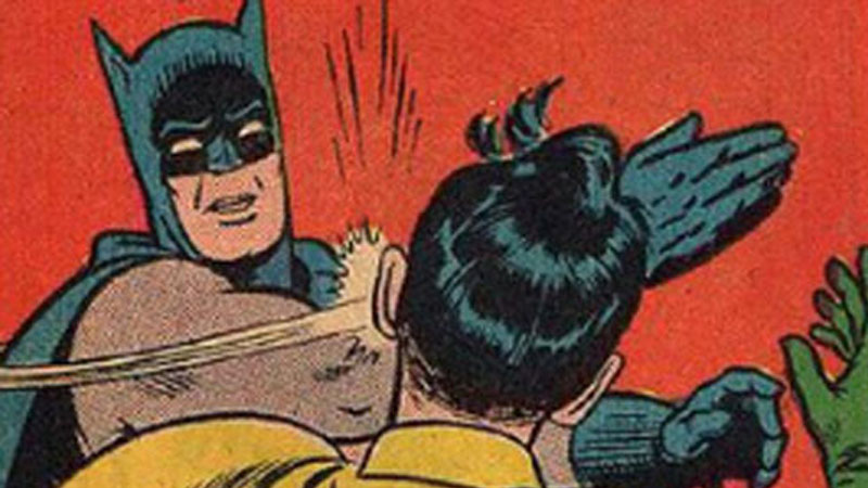 Batman slapping Robin