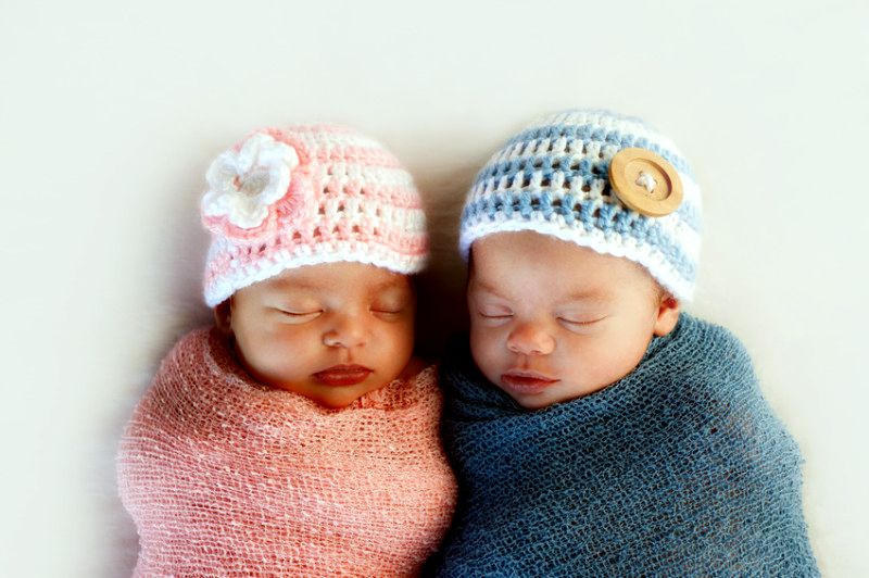 image of male baby and female baby side by side