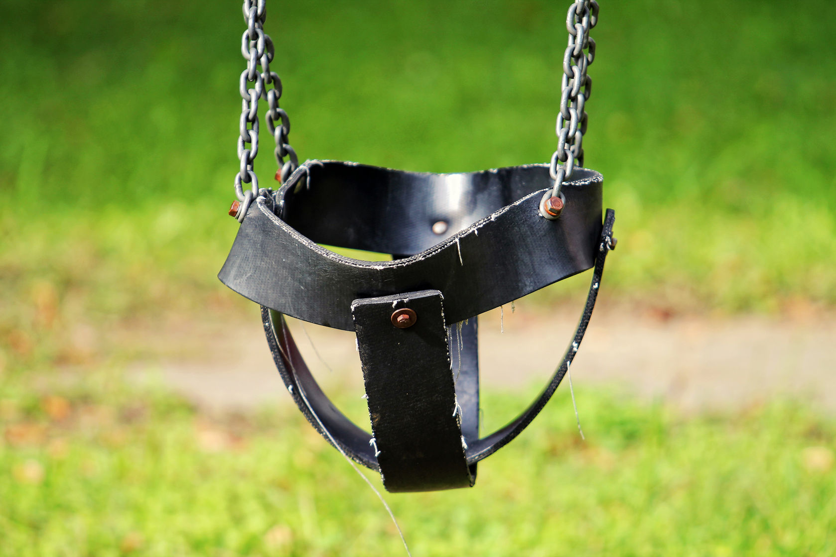 36434025 - empty swing on the playground
