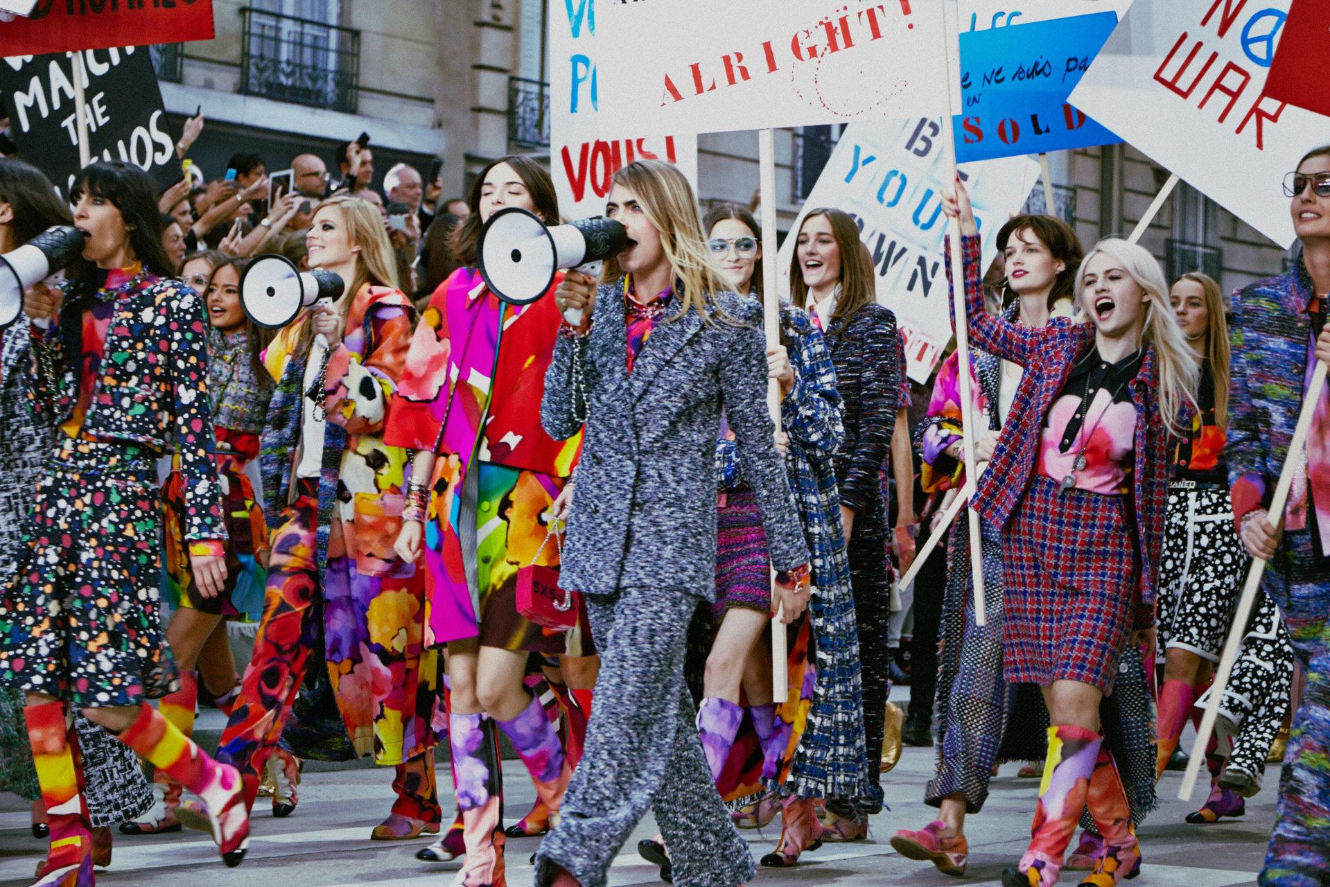 Cara Delevingne leads models down “Boulevard Chanel” for Chanel's  “feminism-inspired” Spring 2015 PFW runway.